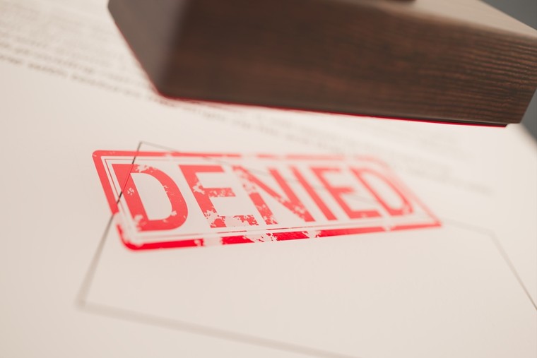 Denied Red Stamp on Paperwork